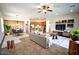 Open-concept living space connects dining and kitchen, with modern decor and natural light at 4116 E Sierra Sunset Trl, Cave Creek, AZ 85331
