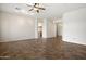 Bright living room featuring tile floors, a ceiling fan, and neutral walls at 4116 E Sierra Sunset Trl, Cave Creek, AZ 85331