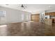 Living space with kitchen access, neutral paint, ceiling fan, and natural lighting at 4116 E Sierra Sunset Trl, Cave Creek, AZ 85331