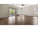 Living space with neutral paint, ceiling fan, and sliding glass doors leading to outdoor space at 4116 E Sierra Sunset Trl, Cave Creek, AZ 85331