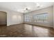 Living space with tile floors, neutral paint, ceiling fan, and great natural light at 4116 E Sierra Sunset Trl, Cave Creek, AZ 85331