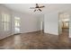 Main bedroom featuring tile floors, a ceiling fan, and access to a patio at 4116 E Sierra Sunset Trl, Cave Creek, AZ 85331