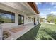 Inviting covered patio with ceiling fans, and plush artificial turf for year-round enjoyment at 4116 E Sierra Sunset Trl, Cave Creek, AZ 85331