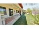 A covered patio with artificial grass provides outdoor entertaining space at 4116 E Sierra Sunset Trl, Cave Creek, AZ 85331