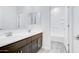 Bright bathroom featuring a double sink vanity and a shower-tub combination at 4240 W Crossflower Ave, San Tan Valley, AZ 85144