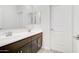 Bathroom with a double vanity, large mirrors, and modern fixtures at 4240 W Crossflower Ave, San Tan Valley, AZ 85144