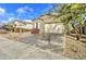 Inviting single-story home with landscaped front yard and attached two-car garage at 4240 W Crossflower Ave, San Tan Valley, AZ 85144