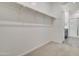 Walk-in closet with carpet and open shelving at 4240 W Crossflower Ave, San Tan Valley, AZ 85144