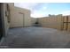 Large backyard patio with brick wall and additional storage in back at 4409 E Wood St, Phoenix, AZ 85040
