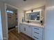 Bathroom features new vanity with stone countertop, stylish fixtures, and a walk-in shower at 4524 W Larkspur Dr, Glendale, AZ 85304