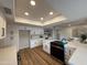 Spacious, updated kitchen with stainless appliances, white cabinets and quartz countertop at 4524 W Larkspur Dr, Glendale, AZ 85304