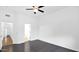 Bright bedroom features hardwood floors, ceiling fan, and a neutral color palette at 4533 N 22Nd St # 228, Phoenix, AZ 85016