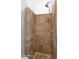 Walk-in shower features stone walls, tile accents, and modern fixtures at 4533 N 22Nd St # 228, Phoenix, AZ 85016