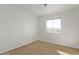 Vacant bedroom with carpet, a window with natural light at 4714 E Belleview St, Phoenix, AZ 85008
