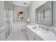 Bright bathroom featuring a glass shower, neutral decor and a white vanity at 4900 E Desert Fairways Dr, Paradise Valley, AZ 85253