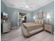 Relaxing bedroom with neutral colors, a ceiling fan, and access to the backyard at 4900 E Desert Fairways Dr, Paradise Valley, AZ 85253