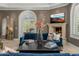 Inviting living room features a fireplace, comfortable seating, and stylish decor at 4900 E Desert Fairways Dr, Paradise Valley, AZ 85253
