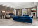 Spacious main bedroom with luxurious furniture, fireplace, and ample natural light, creating a serene and elegant retreat at 4900 E Desert Fairways Dr, Paradise Valley, AZ 85253