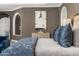 Relaxing main bedroom featuring a plush bed, soft lighting, and stylish decor, creating a comfortable retreat within the home at 4900 E Desert Fairways Dr, Paradise Valley, AZ 85253