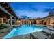 Beautiful pool featuring lounge chairs and a patio that provides a luxurious backyard retreat at 4900 E Desert Fairways Dr, Paradise Valley, AZ 85253