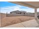 Spacious backyard with block wall and potential for landscaping and outdoor living space at 5611 S Feliz --, Mesa, AZ 85212