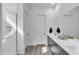 Modern bathroom featuring double vanity, a shower, and sleek black hardware at 5611 S Feliz --, Mesa, AZ 85212