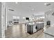 Expansive view of the kitchen and living area, creating an inviting space for Gathering and guests at 5611 S Feliz --, Mesa, AZ 85212
