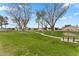 Expansive community park featuring walking paths and shaded seating areas at 5735 E Mcdowell Rd # 147, Mesa, AZ 85215