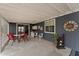View of the covered patio with furniture, bar, and decorative accents at 5735 E Mcdowell Rd # 147, Mesa, AZ 85215
