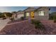 Inviting home featuring a welcoming entrance, well-manicured landscaping, and a cozy facade at 6404 W Black Hill Rd, Phoenix, AZ 85083