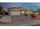 Well-kept home boasts a two-car garage and low-maintenance desert landscaping at 6404 W Black Hill Rd, Phoenix, AZ 85083