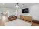 Bright living room with a modern style with light hardwood floors and white walls at 6404 W Black Hill Rd, Phoenix, AZ 85083