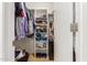 Organized walk-in closet featuring shelving for optimal storage and convenience at 6917 E Flossmoor Ave, Mesa, AZ 85208