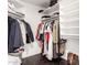 Walk-in closet featuring built-in shelving and stylish organization at 7849 W Kristal Way, Glendale, AZ 85308