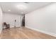 Spacious living room with hardwood floors, neutral colors, and plenty of natural light at 7849 W Kristal Way, Glendale, AZ 85308