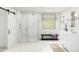 Elegant bathroom with glass-enclosed shower, double vanity, and modern fixtures at 7975 W Griswold Rd, Peoria, AZ 85345