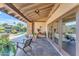 Covered patio space with outdoor furniture and unobstructed view of the yard at 9677 E Gold Dust Ave, Scottsdale, AZ 85258