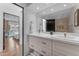 Bright bathroom features double vanity, modern fixtures, and a luxurious walk-in shower at 9677 E Gold Dust Ave, Scottsdale, AZ 85258