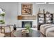 Inviting living room showcasing fireplace, modern decor, and comfortable seating arrangement at 9677 E Gold Dust Ave, Scottsdale, AZ 85258