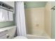 Bathroom featuring a bathtub and towel rack at 9859 W Irma Ln, Peoria, AZ 85382