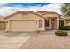 Charming single-story home featuring a tile roof and a two-car garage at 9859 W Irma Ln, Peoria, AZ 85382