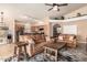 Open-concept living room flowing into the kitchen, perfect for entertaining at 9859 W Irma Ln, Peoria, AZ 85382