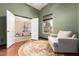 Cozy living room showcasing an open doorway, neutral tones, and views of the adjacent room at 9859 W Irma Ln, Peoria, AZ 85382
