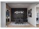 Modern dining room featuring stylish lighting, a decorative wall, and seating for six at 10242 N 57Th St, Paradise Valley, AZ 85253