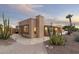 Desert plants highlight backyard views from an outdoor living area with privacy and room to roam at 10322 E Breathless Ave, Gold Canyon, AZ 85118