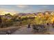 Panoramic view of the desert landscape and mountains from the backyard patio at 10322 E Breathless Ave, Gold Canyon, AZ 85118