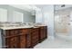 Elegant bathroom featuring a double vanity and a separate shower at 10322 E Breathless Ave, Gold Canyon, AZ 85118