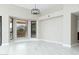 Living room featuring large windows, recessed lighting, tiled floors, and views of the surrounding landscape at 10322 E Breathless Ave, Gold Canyon, AZ 85118