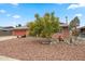 Charming home with desert landscaping, including rocks and mature succulents at 10453 W White Mountain Rd, Sun City, AZ 85351