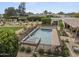 Aerial view of pool and backyard area, with landscaping, playground, and plenty of space at 11601 N 85Th St, Scottsdale, AZ 85260